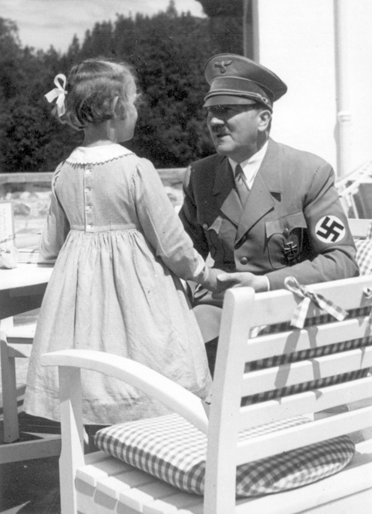 Adolf Hitler with a little girl on the terrace of Haus Wachenfeld, from Eva Braun's albums